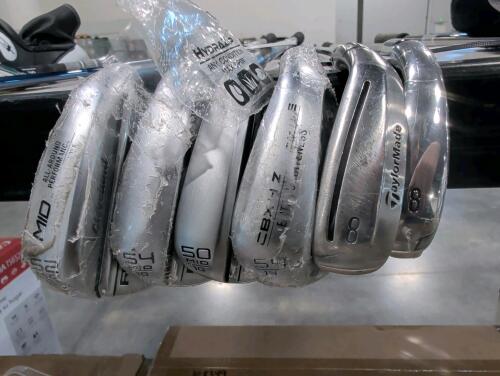 golf irons: Cleveland RTX6, 50&deg; wedge, Cleveland and TaylorMade 8. iron, Callaway 8. iron
