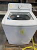 LG washer appears new but does have stickers