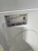 LG washer appears new but does have stickers - 6