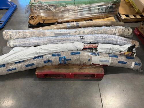 Pallet of rugs