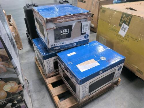 Three GE countertop microwaves