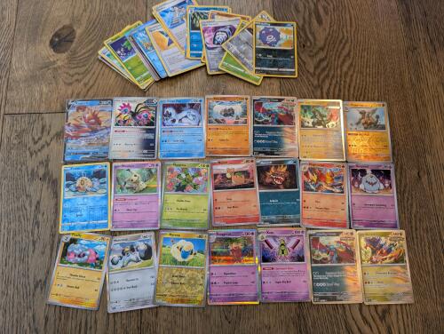 50 Pokemon Holo/reverse holo's